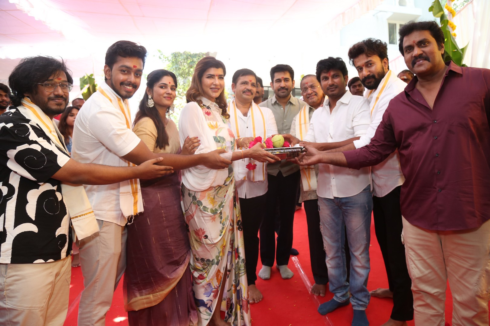Star cast holding pooja thali for photoshoot