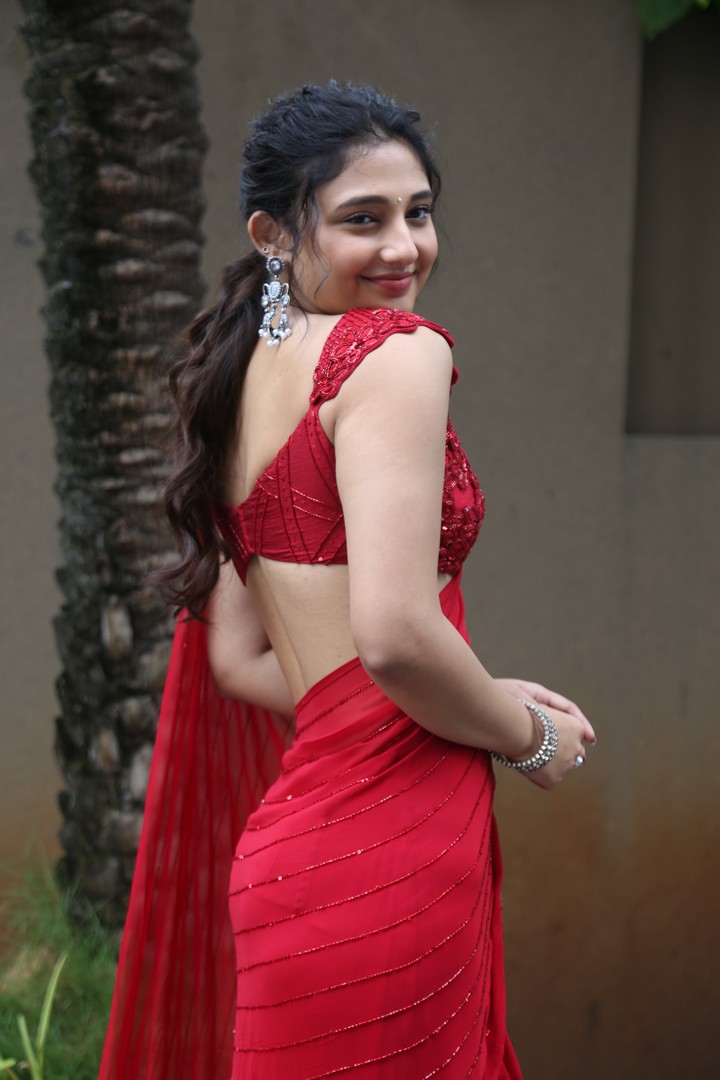 Ritika Nayak in red saree with bold beautiful style