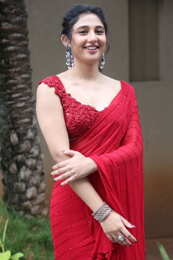 Ritika Nayak in fiery red saree with sparkling elegance