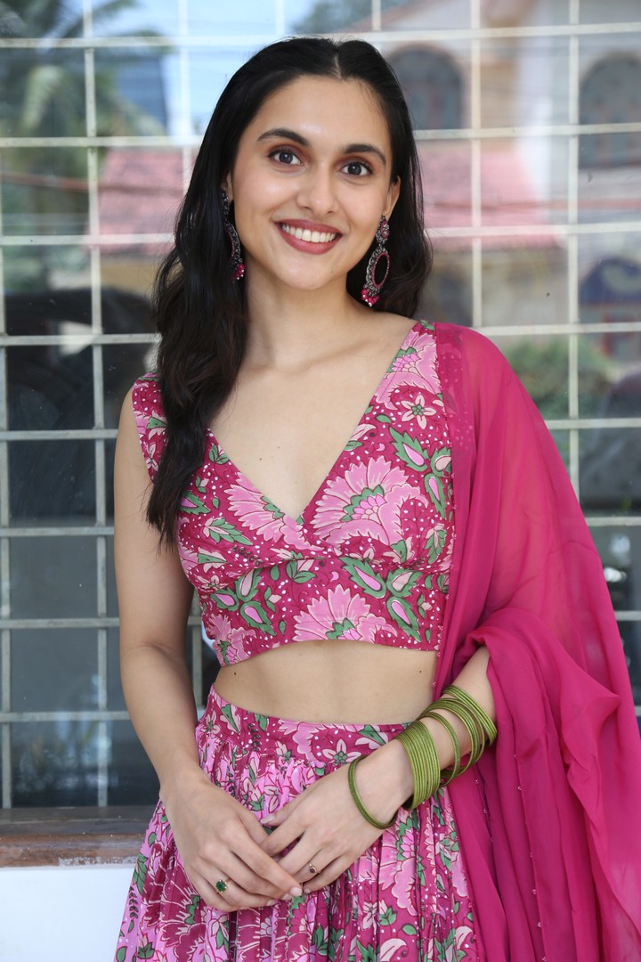 Riya Jithu in floral attire with vibrant hues