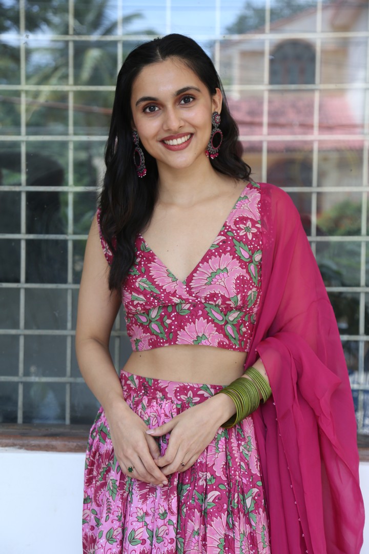 Riya Jithu in pink floral ensemble with grace