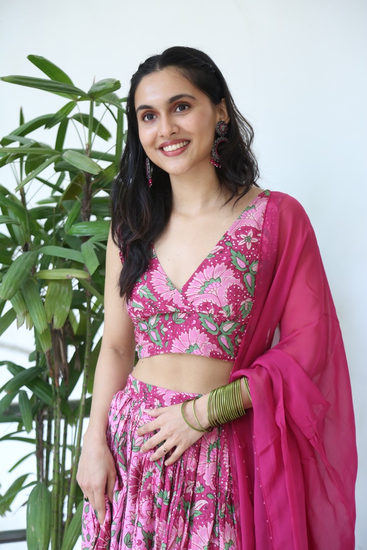 Riya Jithu in floral outfit with bold accessories