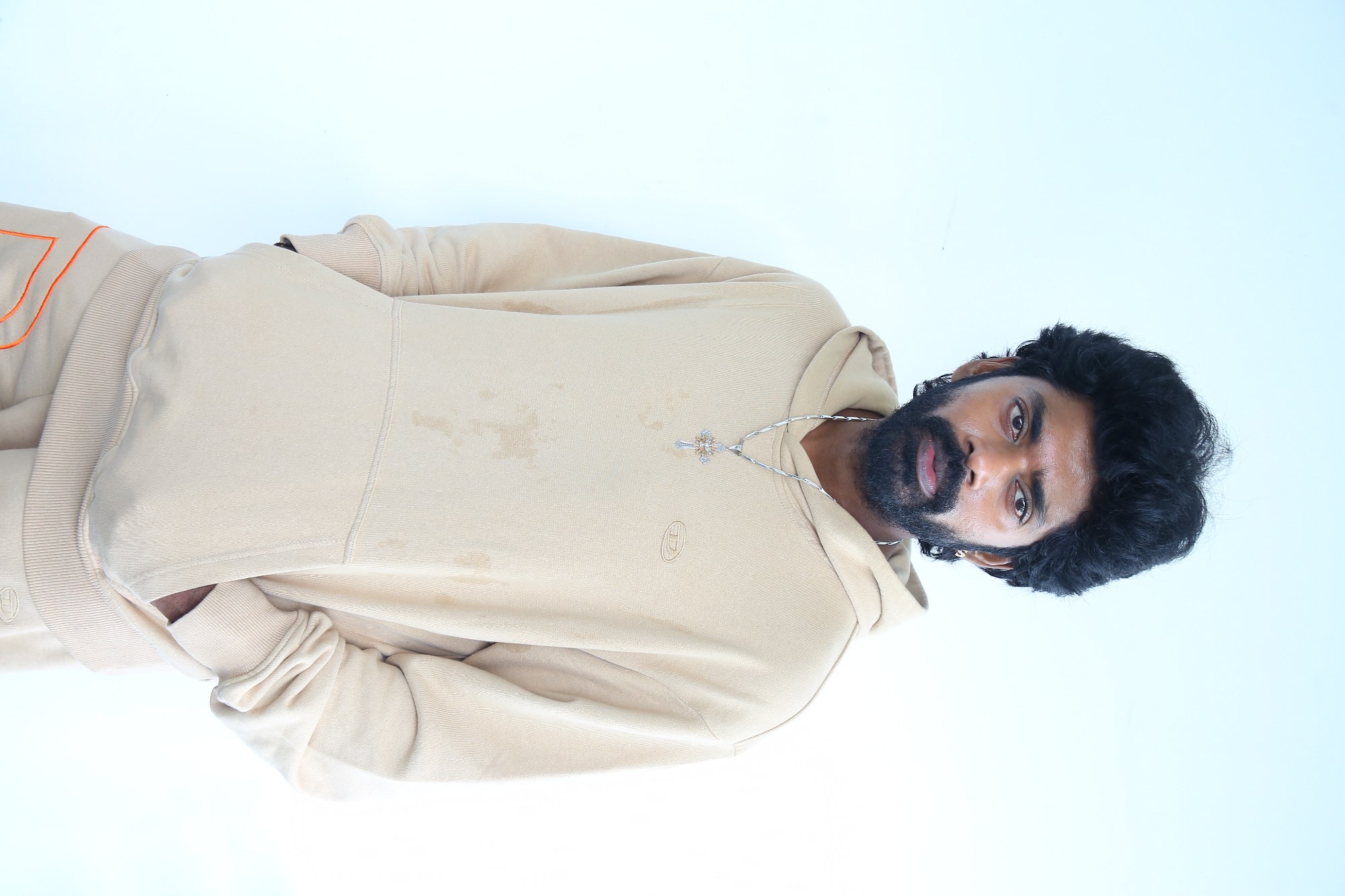 Sandy Master rocking street style with blinged hoodie