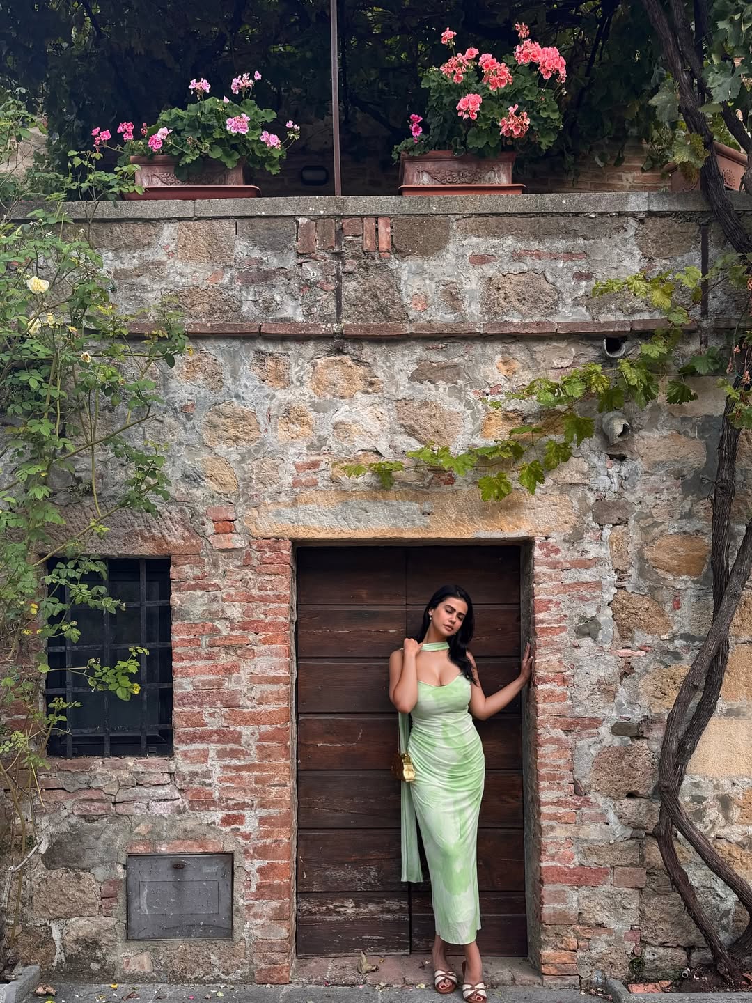 Sharmiela Mandre chic in green gown rustic runway