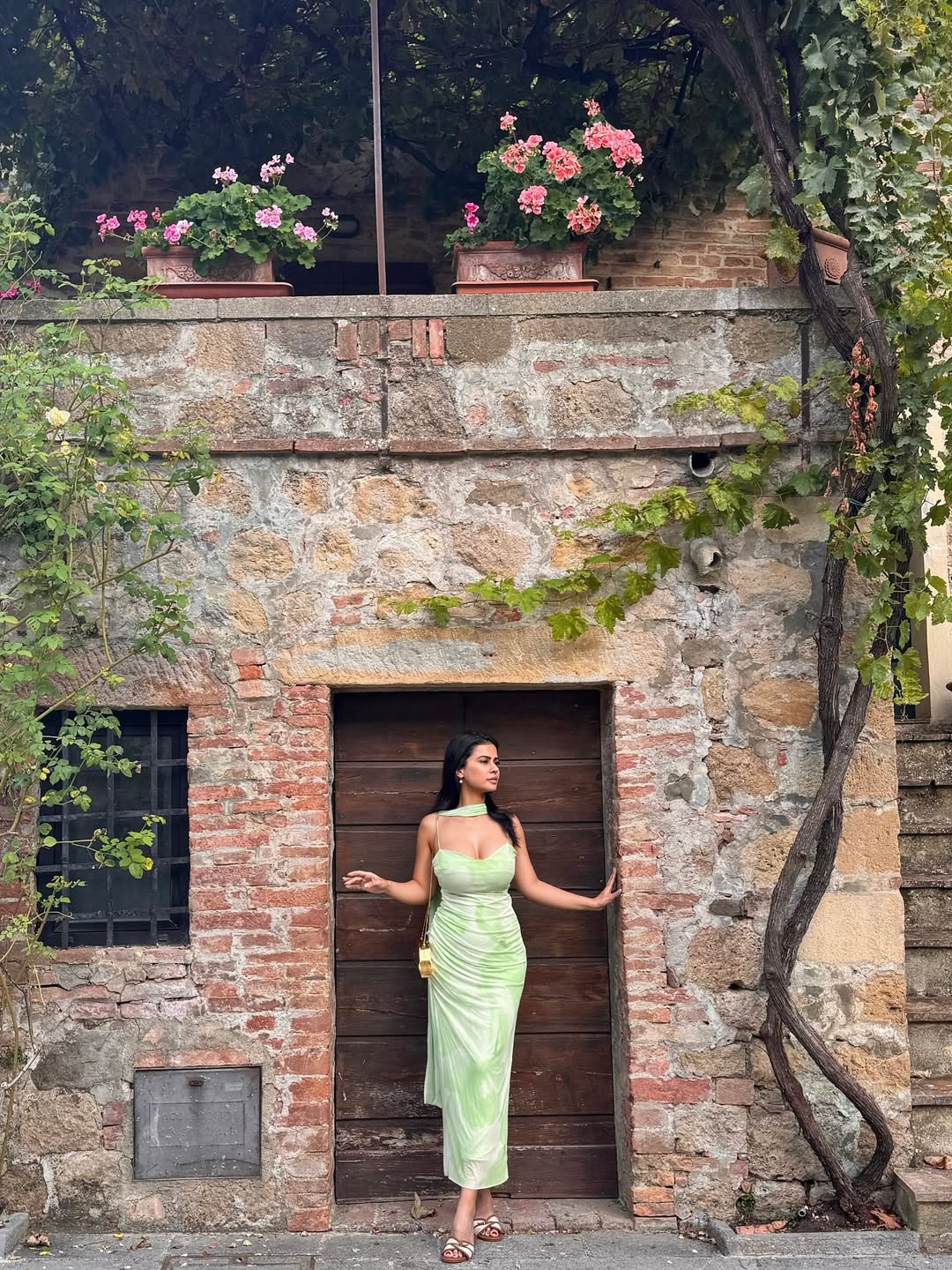Sharmiela Mandre elegant in sleek lime green dress