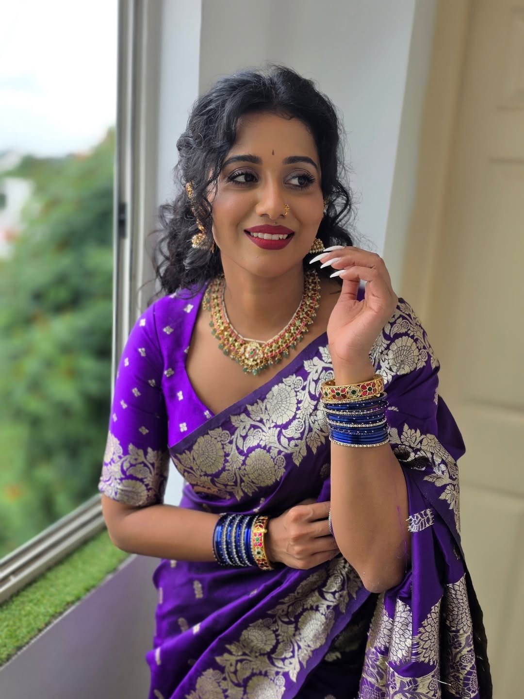 Shilpa Manjunath regal charm in purple saree