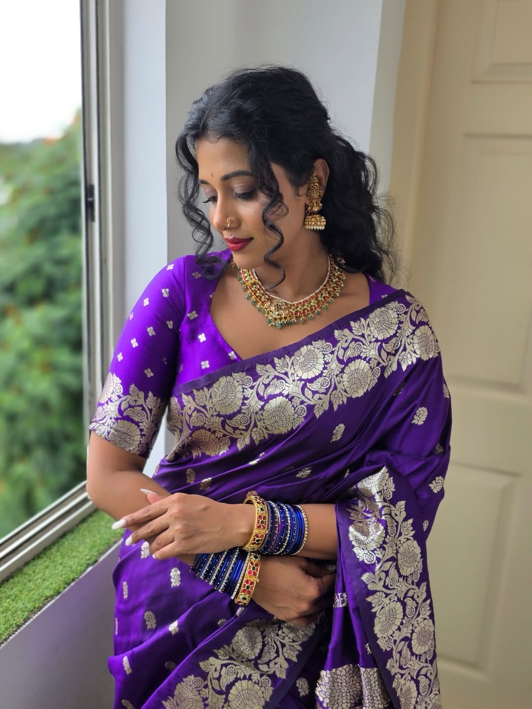 Shilpa Manjunath elegant purple saree with gold embroidery