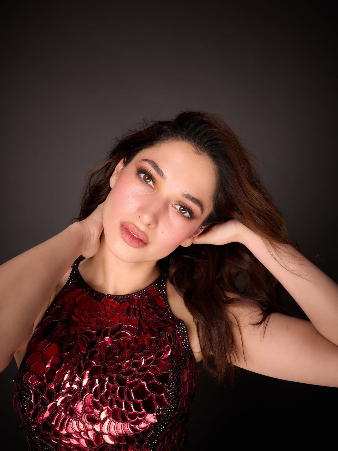 Tamannaah Bhatia stuns in shimmering red sexy style