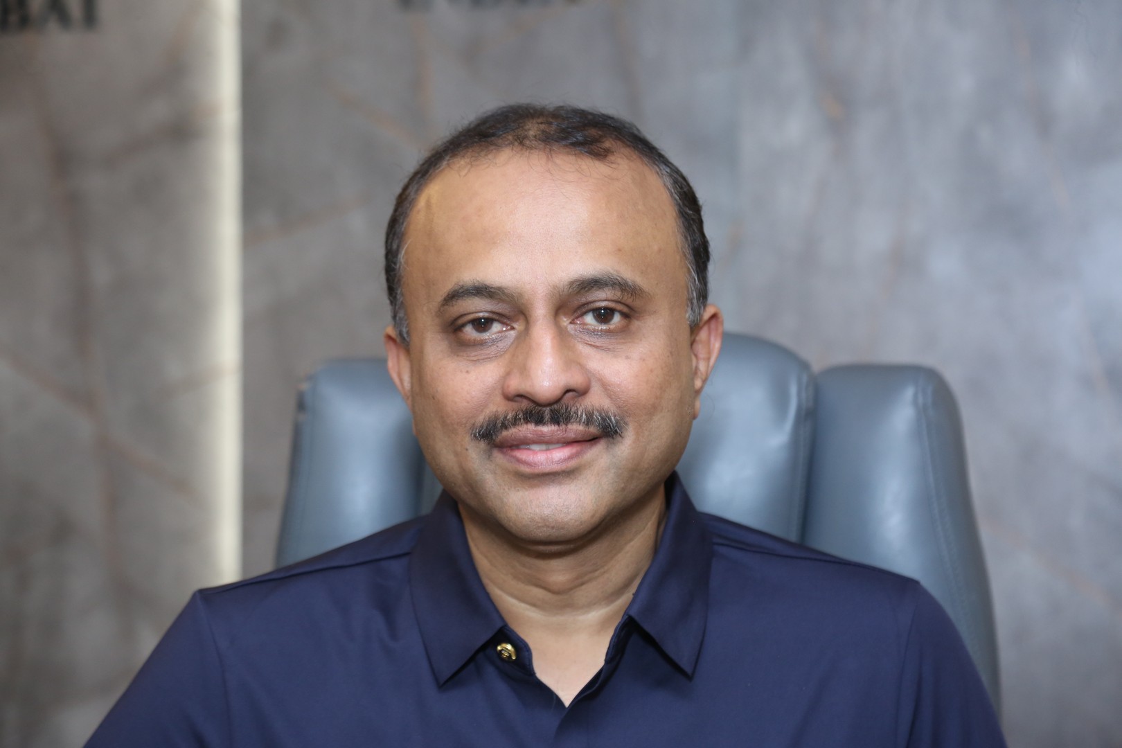 TG Vishwa Prasad exudes sharp executive style in navy shirt