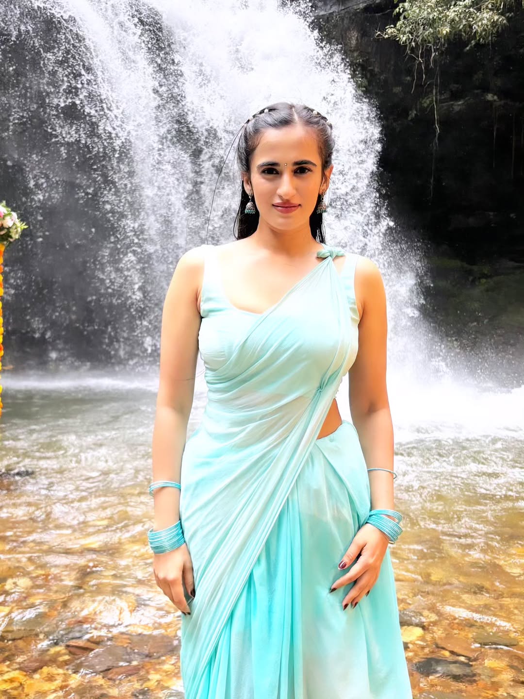 Thapaswini Poonacha blending grace and style by waterfall