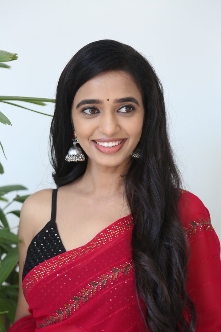 Trupthi Ravindra regal red saree with golden detailing