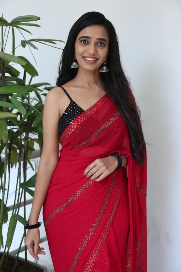 Trupthi Ravindra vibrant red saree with sparkling charm