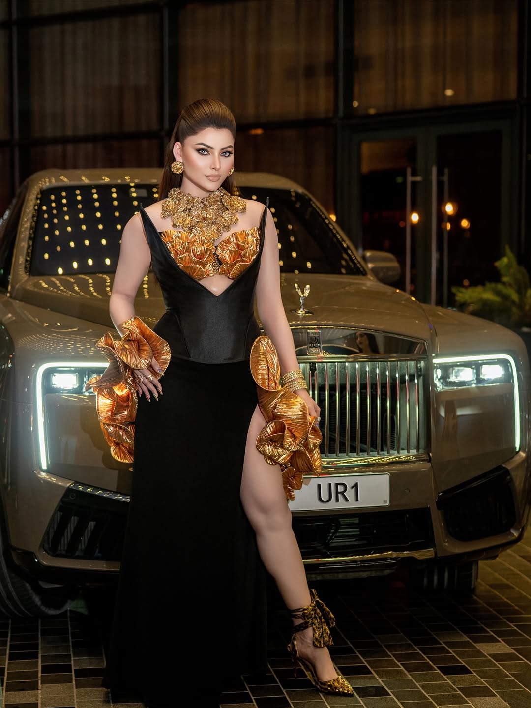 Urvashi Rautela golden glamour with luxury ride style
