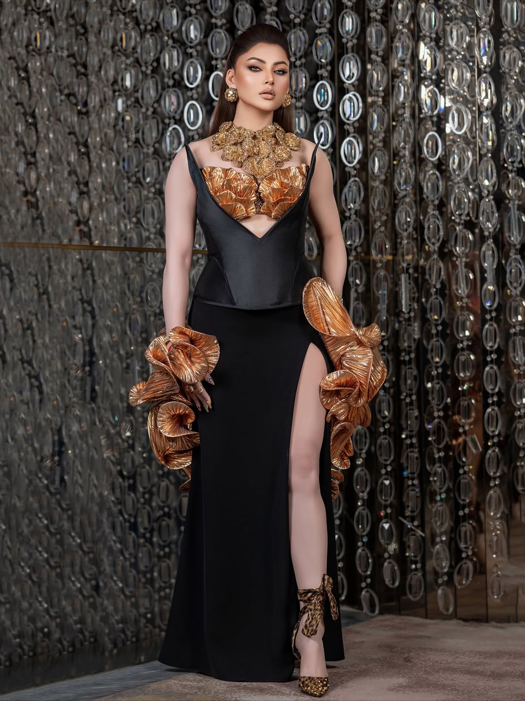 Urvashi Rautela fierce flawless look in black gold gown