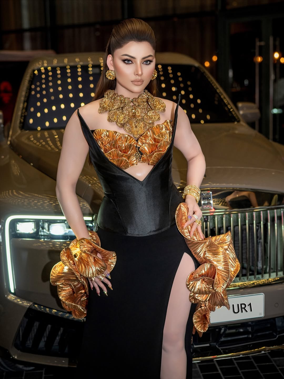 Urvashi Rautela glamorous black dress with golden details