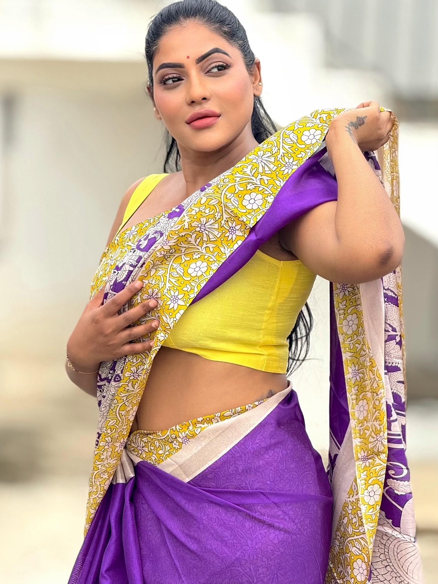 Reshma Pasupuleti stuns in purple and yellow saree ensemble