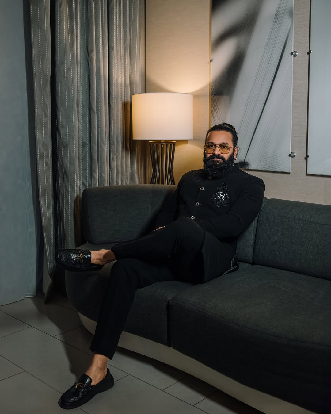 Rishab Shetty exuding cool authority in black ensemble look