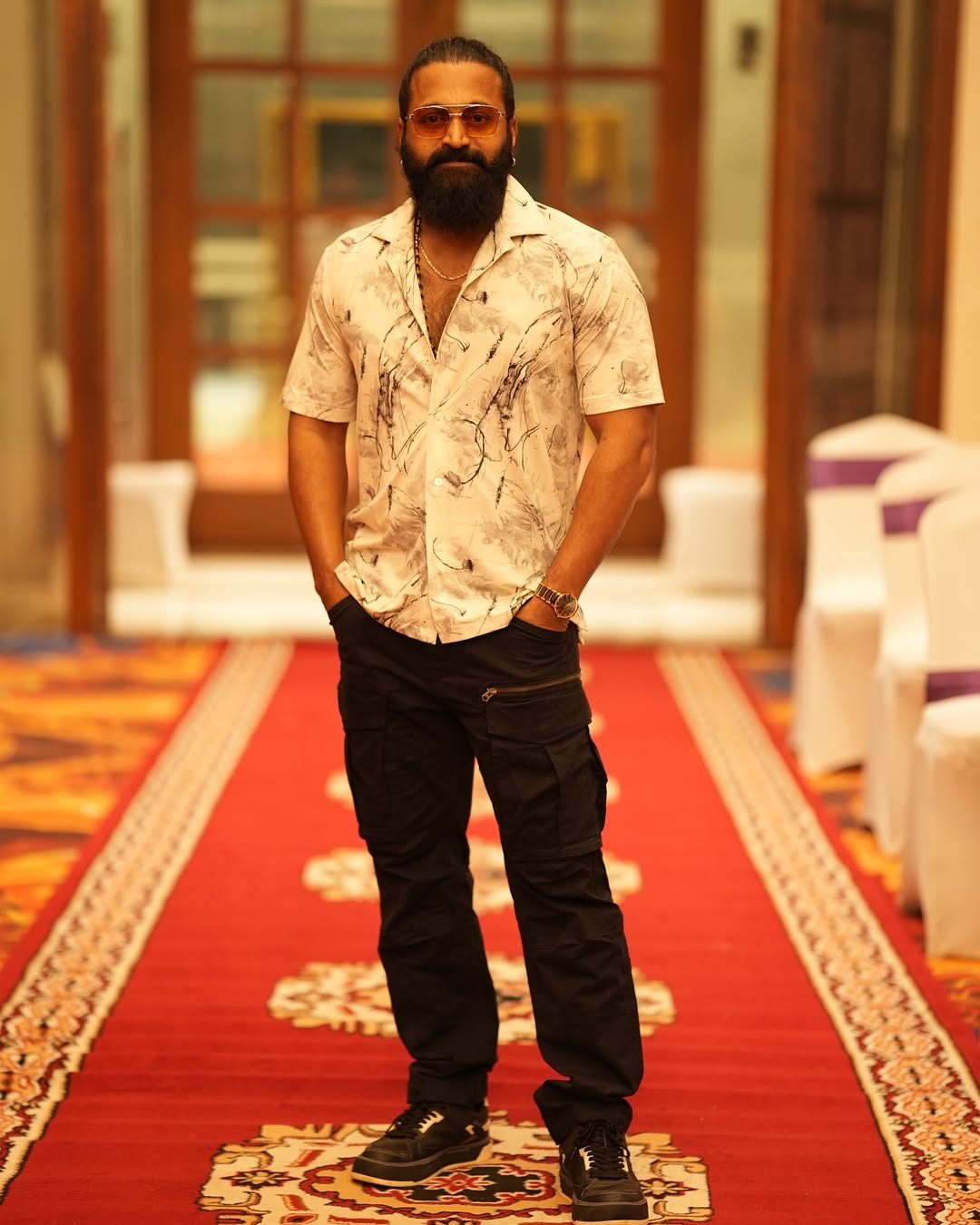 Rishab Shetty keeping it cool in casual shirt and cargo pants
