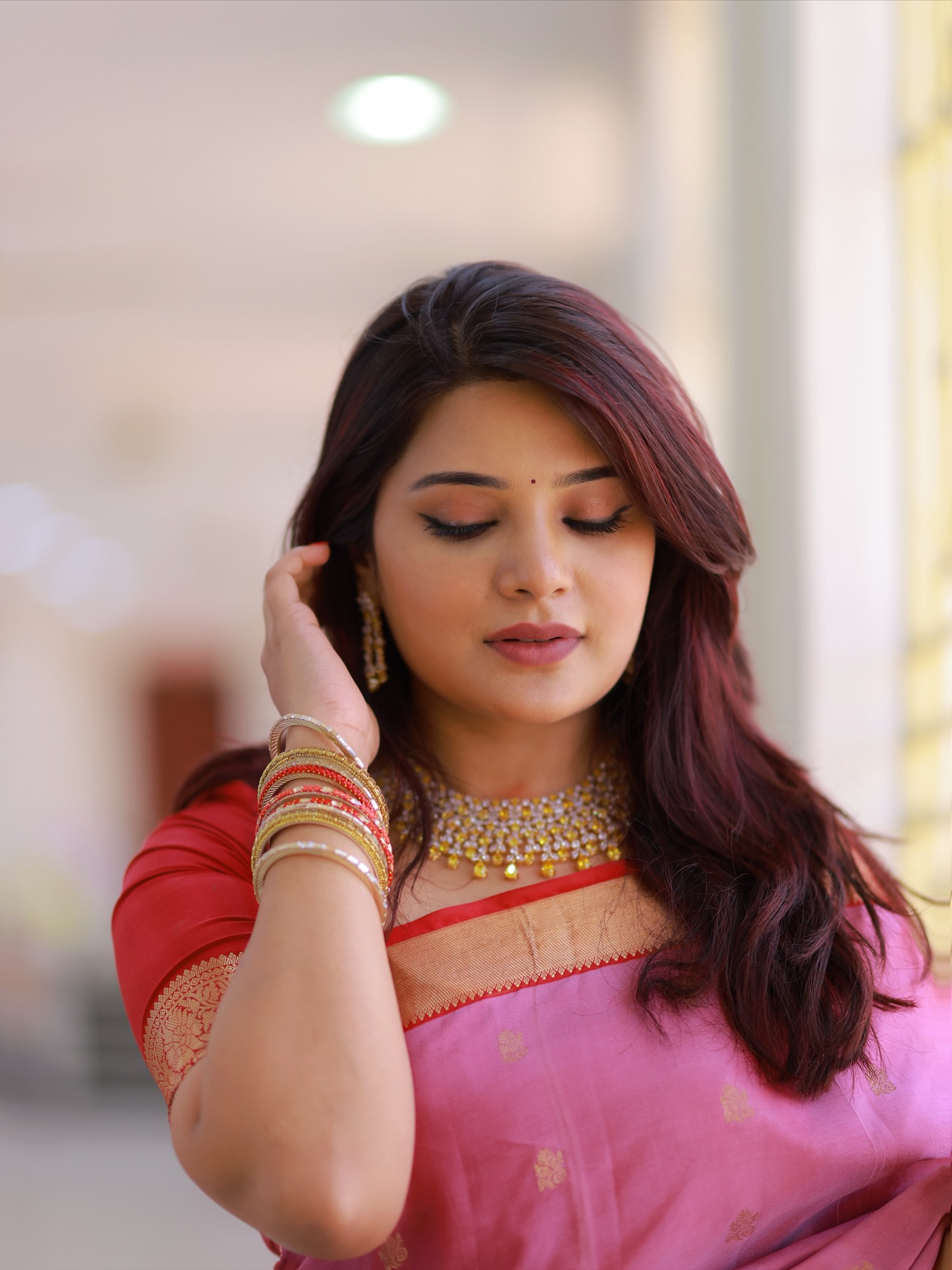 Aathmika blending tradition and modern charm with radiant smile