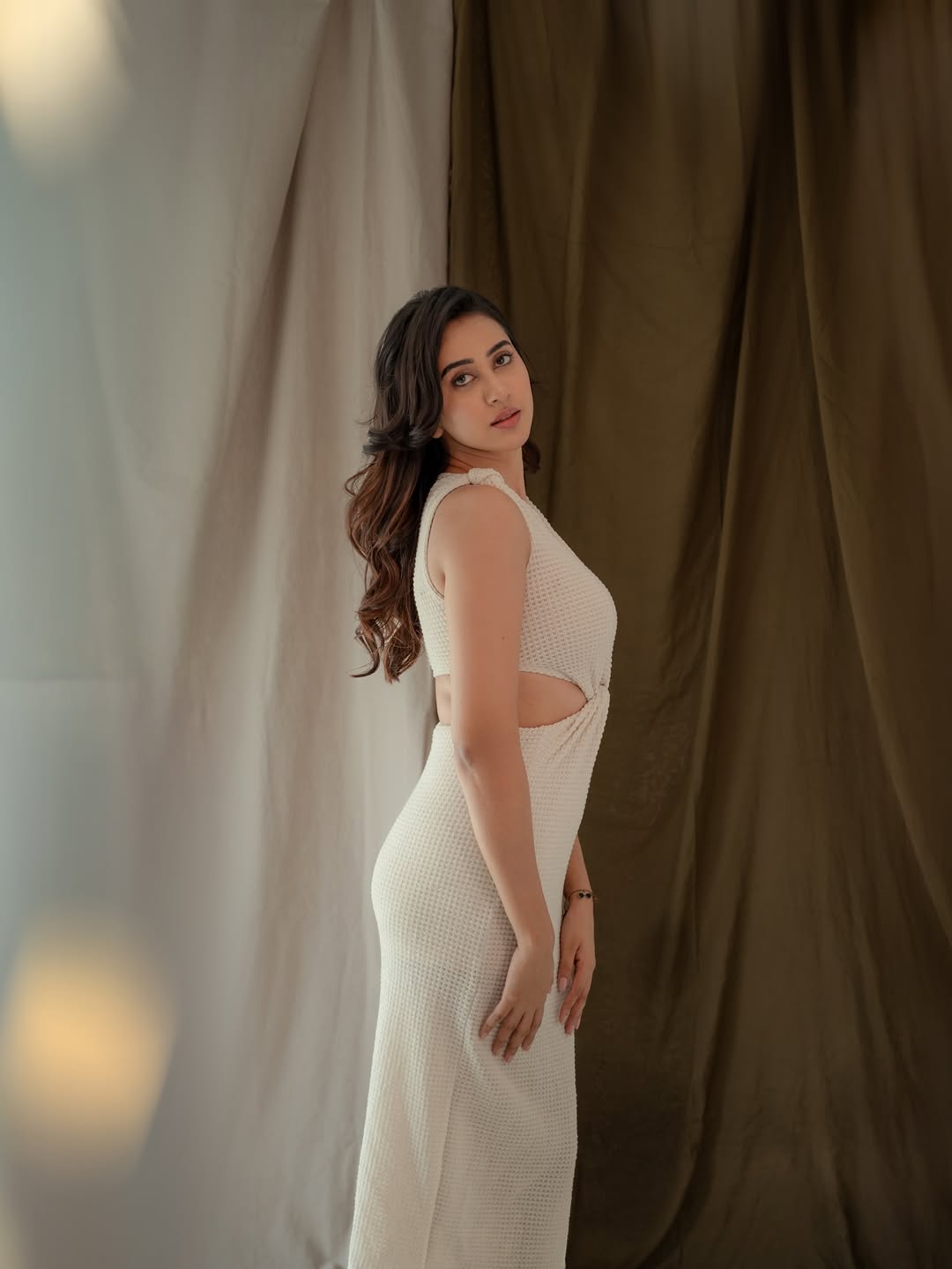 Akshaya Hariharan combines elegance and edge in a chic cut-out dress