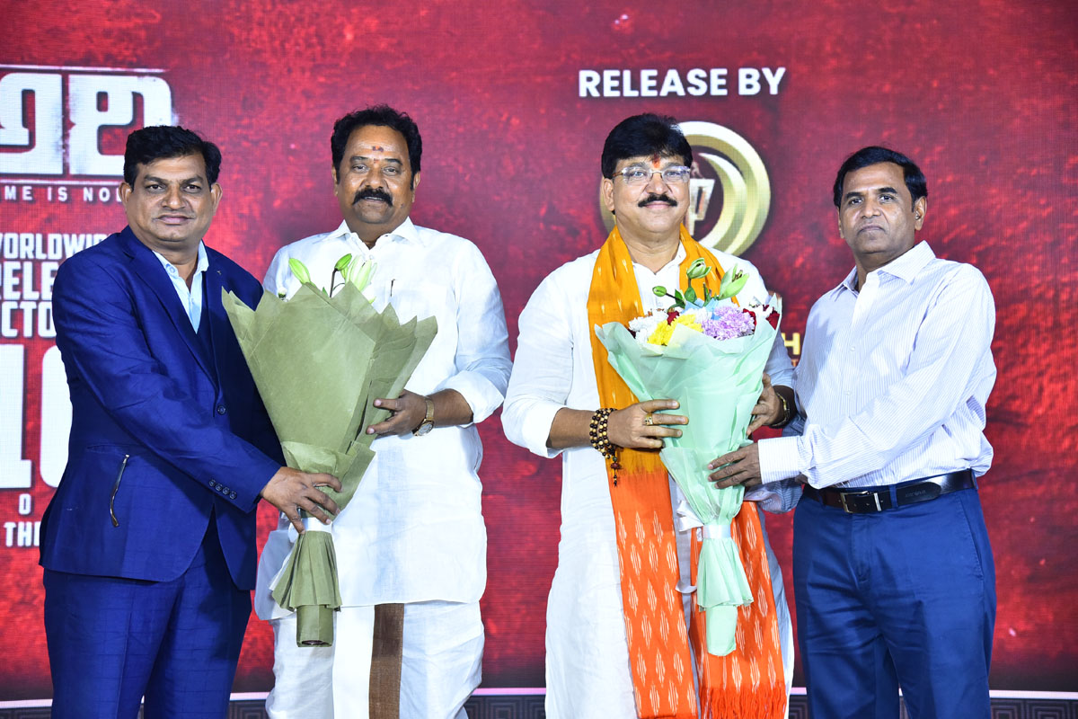 Team presenting flower bouquets to guest MLAs