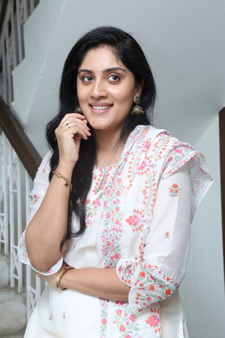 Dhanya Balakrishna stunning in floral attire with radiant smile