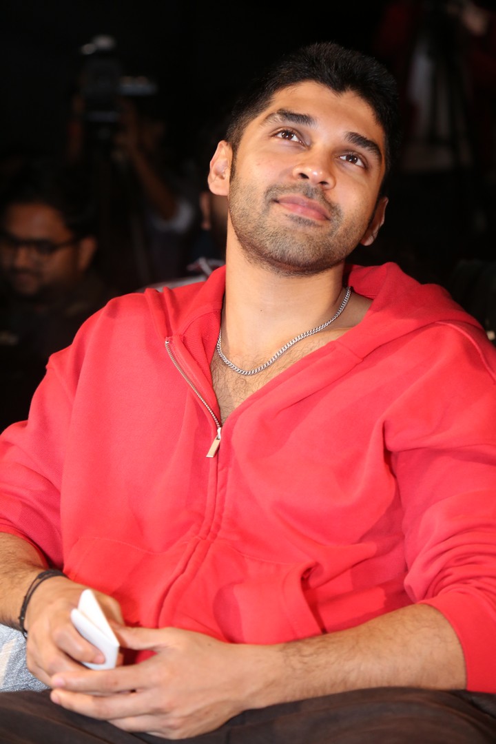 Dhruv Vikram stylish in red hoodie with confident gaze