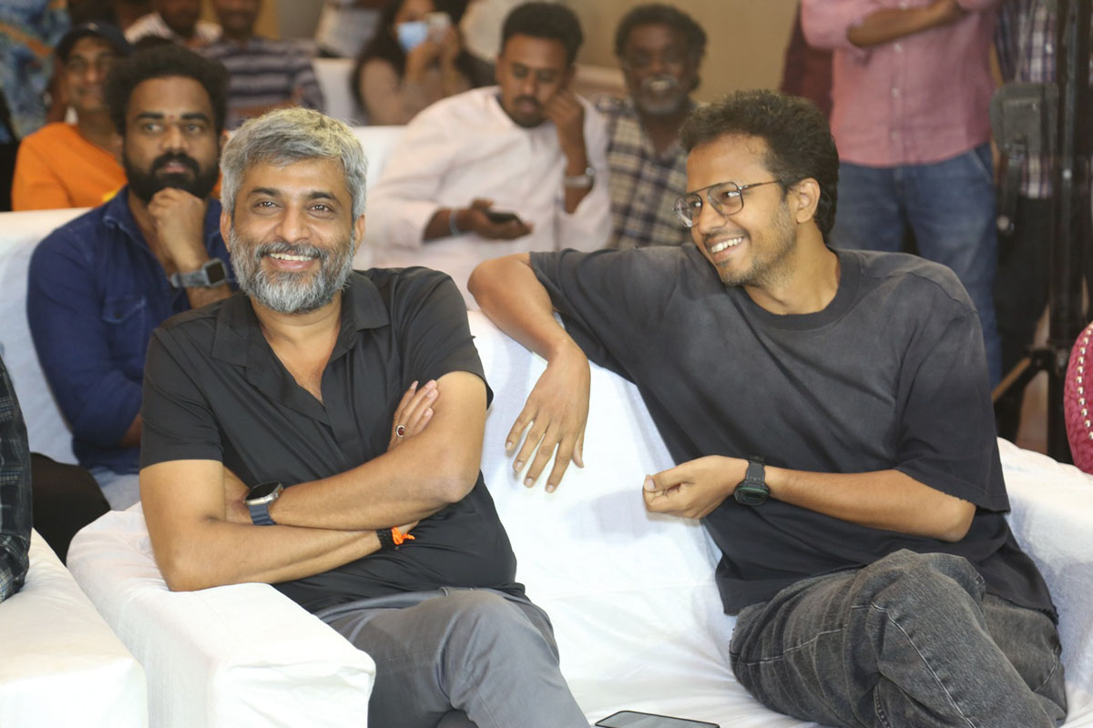 Hanu Raghavapudi seated during event