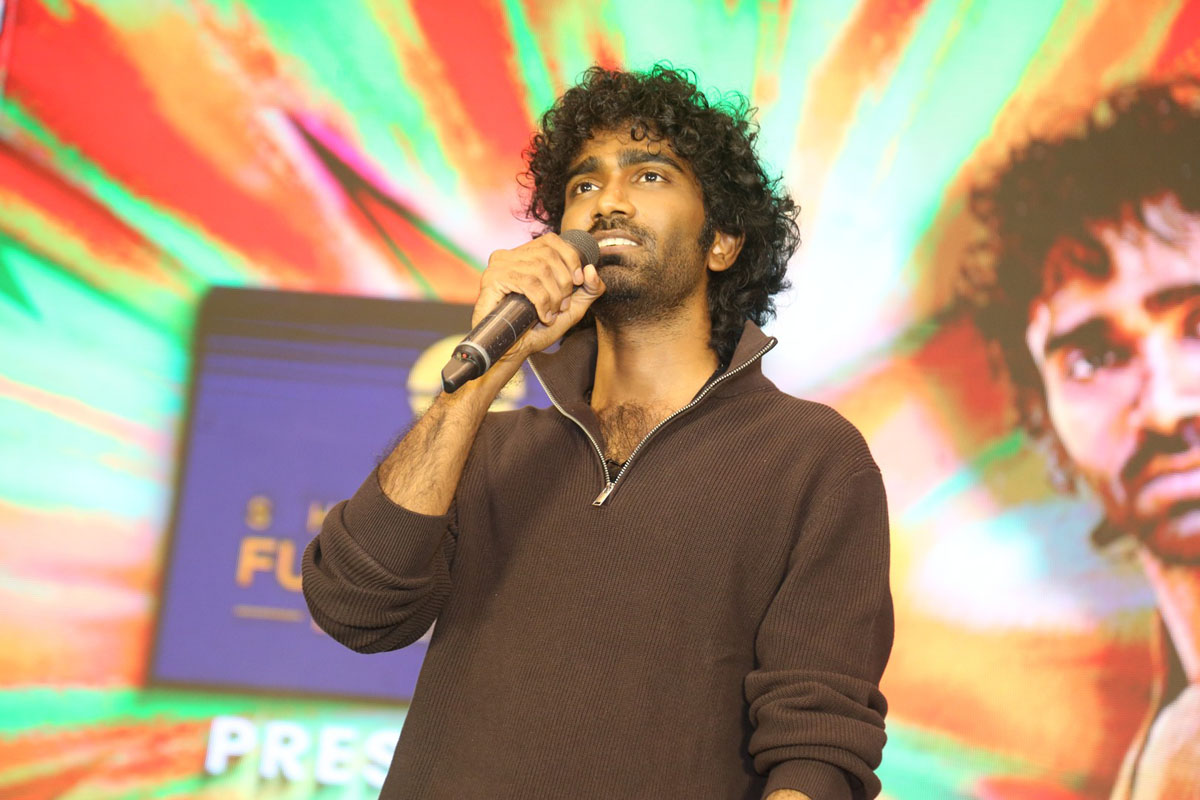 Pradeep Ranganathan giving speech on stage