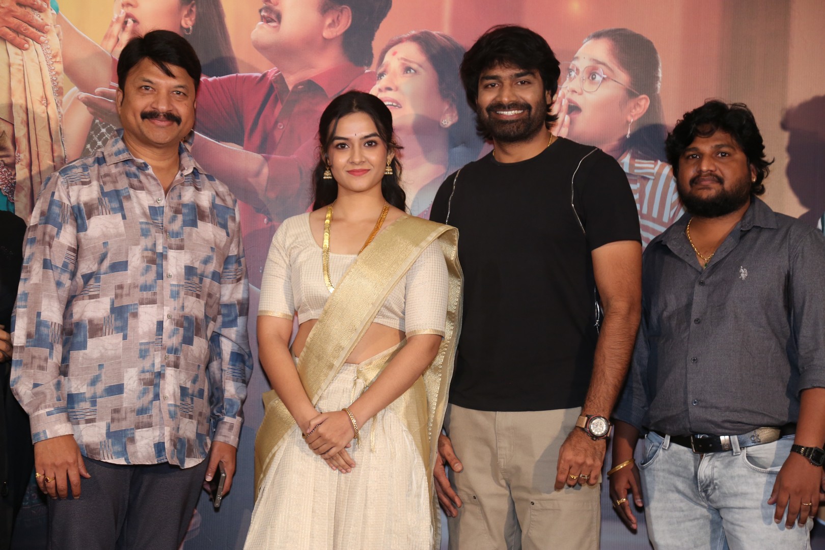 Team at movie trailer launch during event celebration