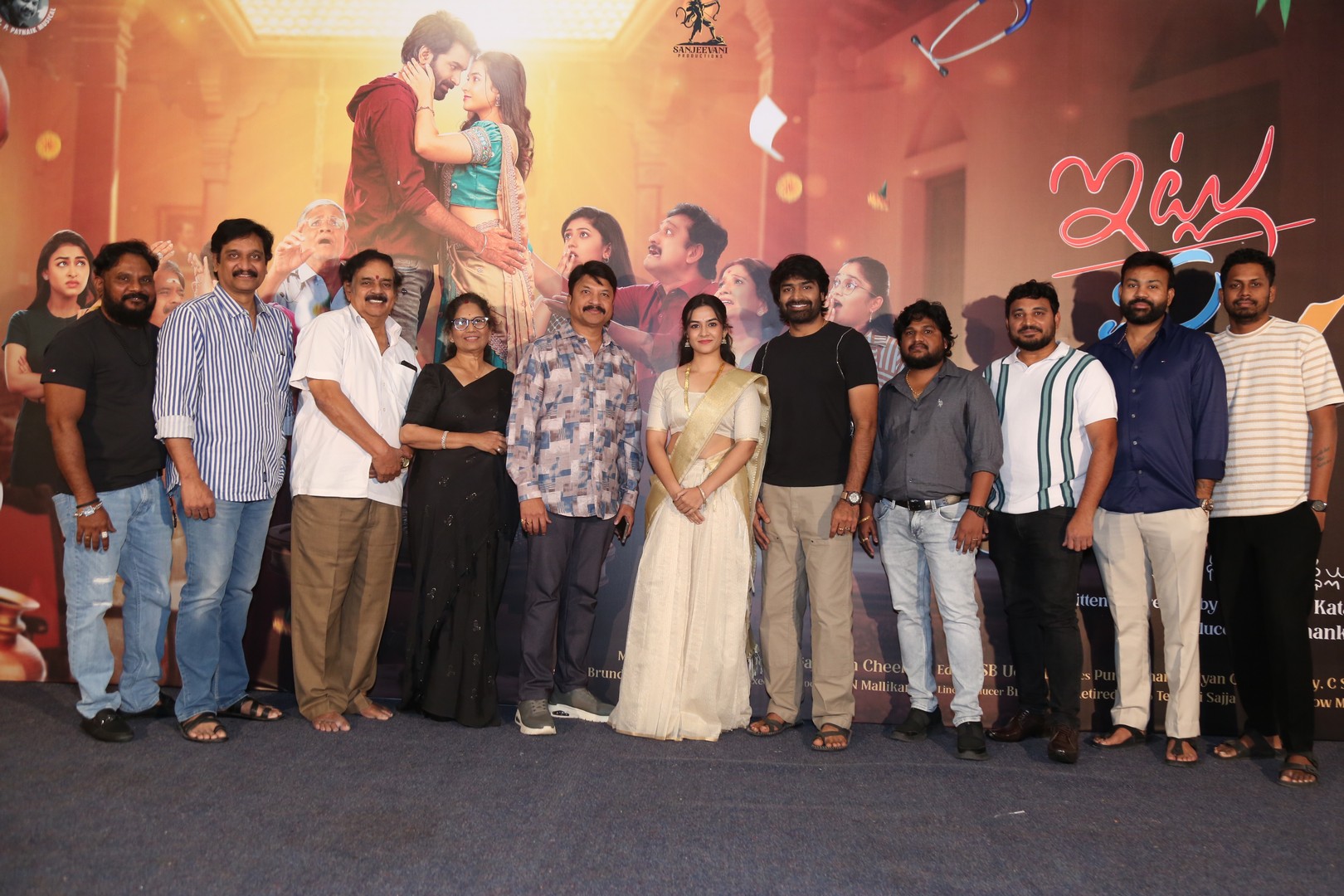 Film crew posing together after trailer unveiling ceremony