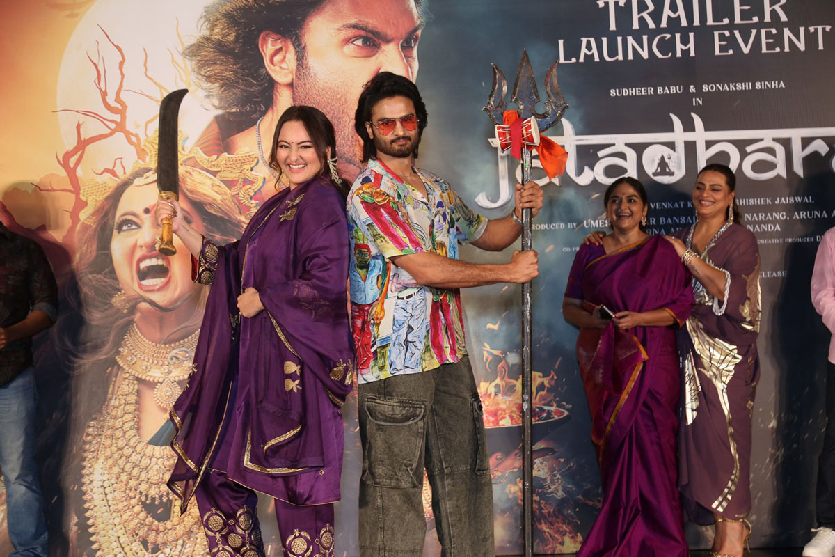 Sonakshi Sinha with billhook and Sudheer Babu with trident posing