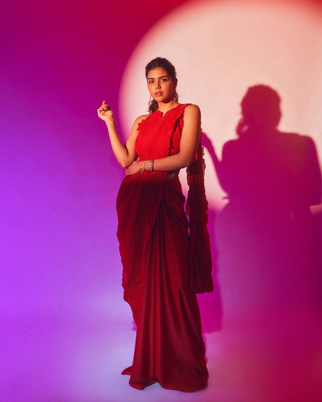 Kalyani Priyadarshan exuding timeless elegance in bold red ensemble