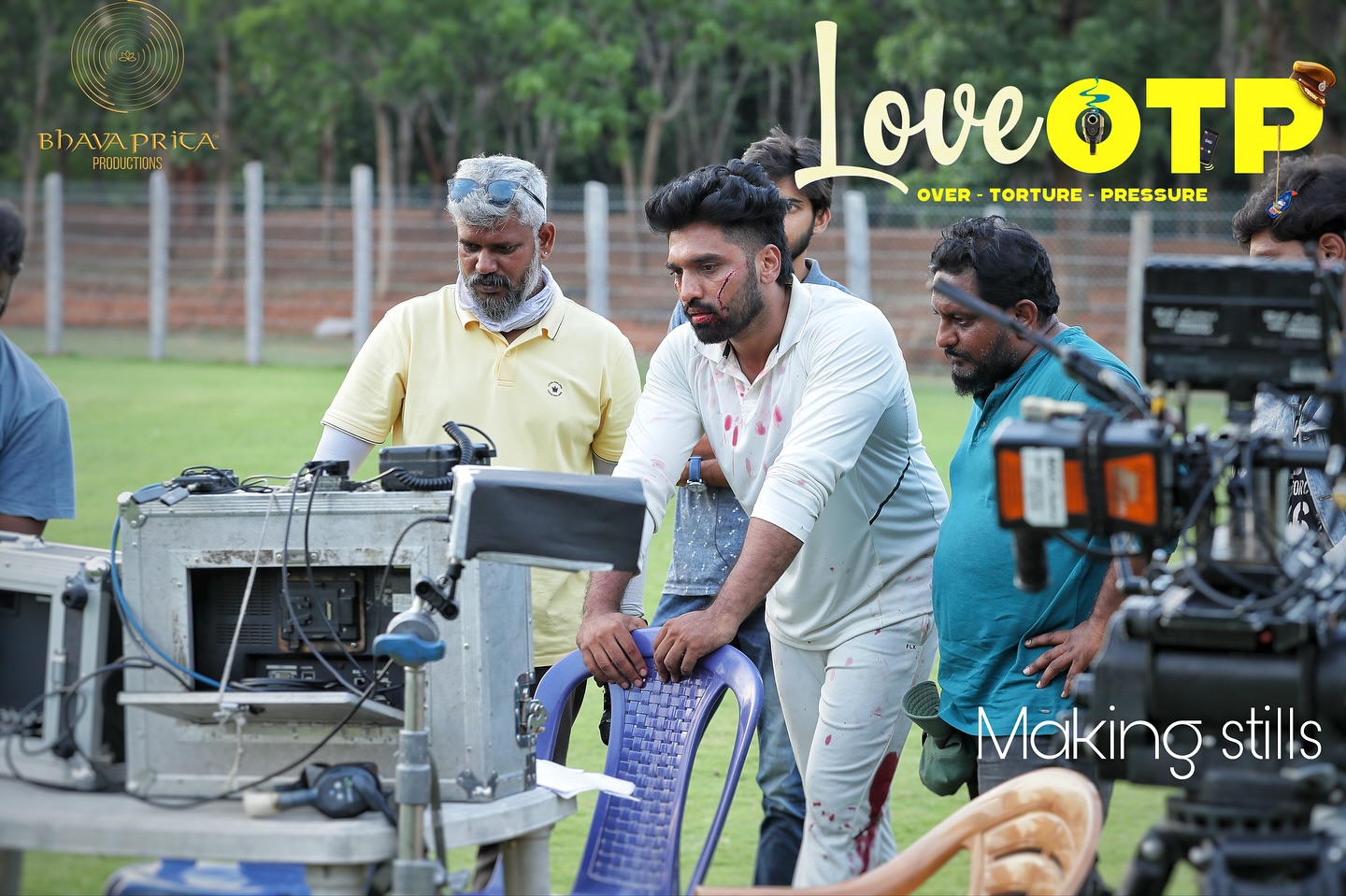 Actor checking screen after shoot