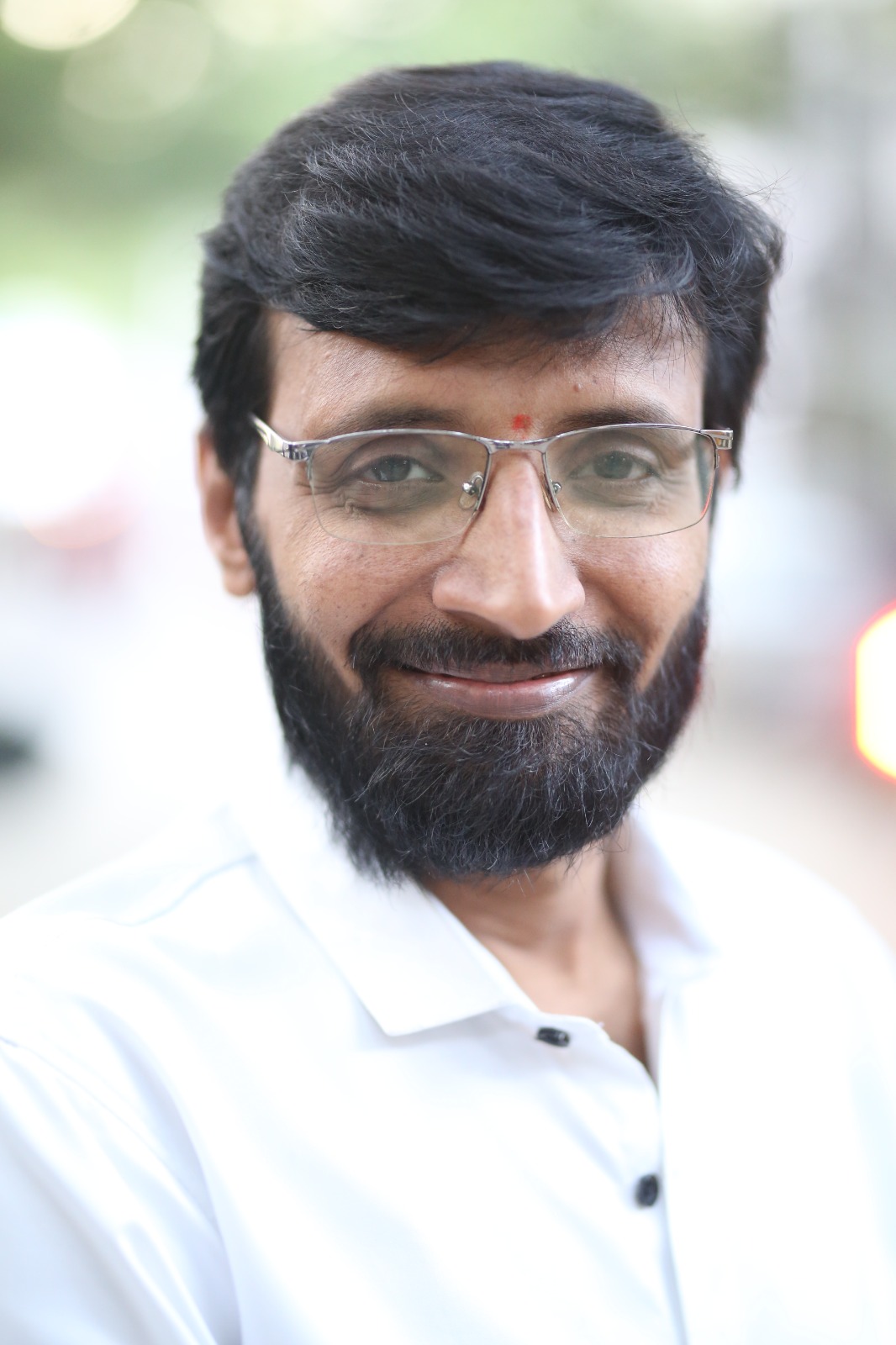 Mallikarjuna Elika in stylish professional look with charm