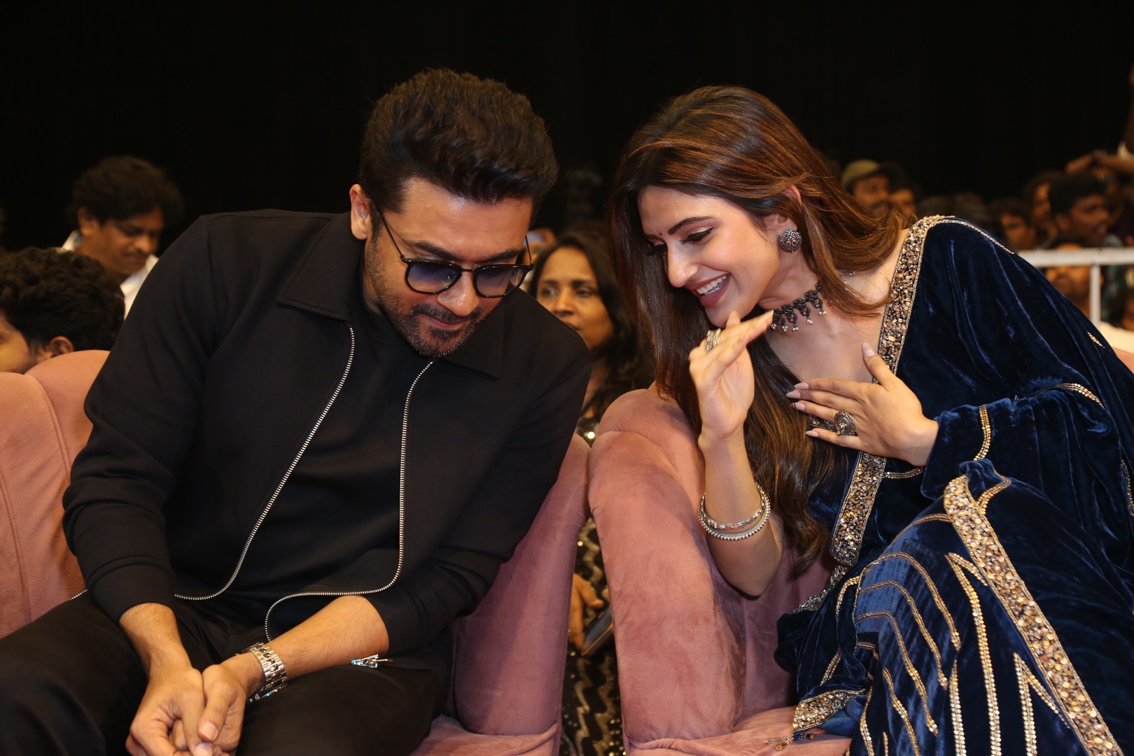 Suriya and Sreeleela conversing during pre-release event