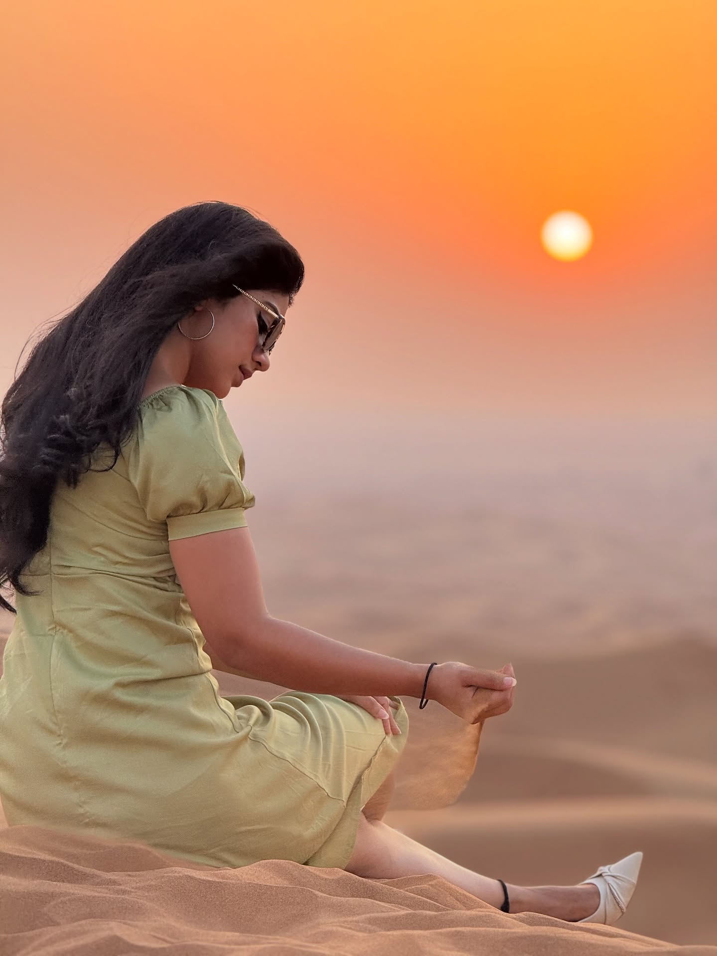 Megha Shetty radiates calm elegance in desert sunset