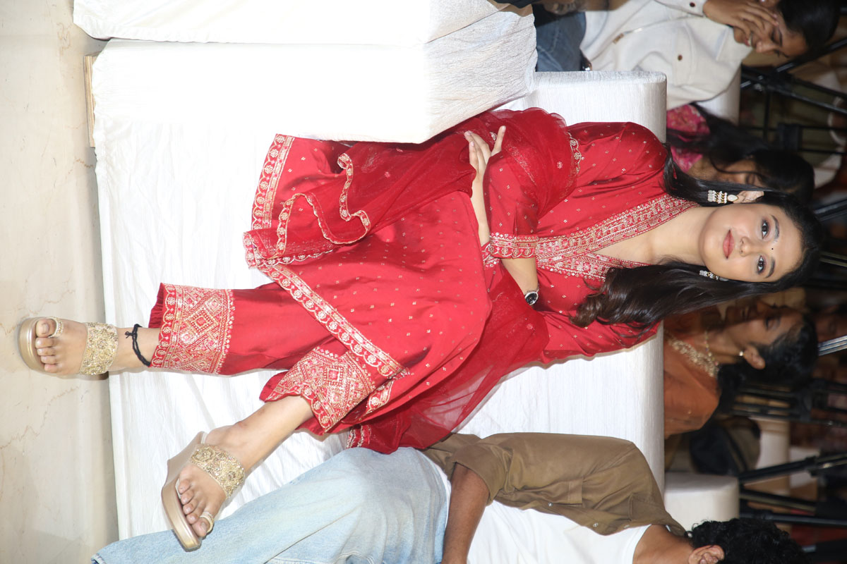 Ritika Nayak seated elegantly at Mirai Movie Platinum Disc Event