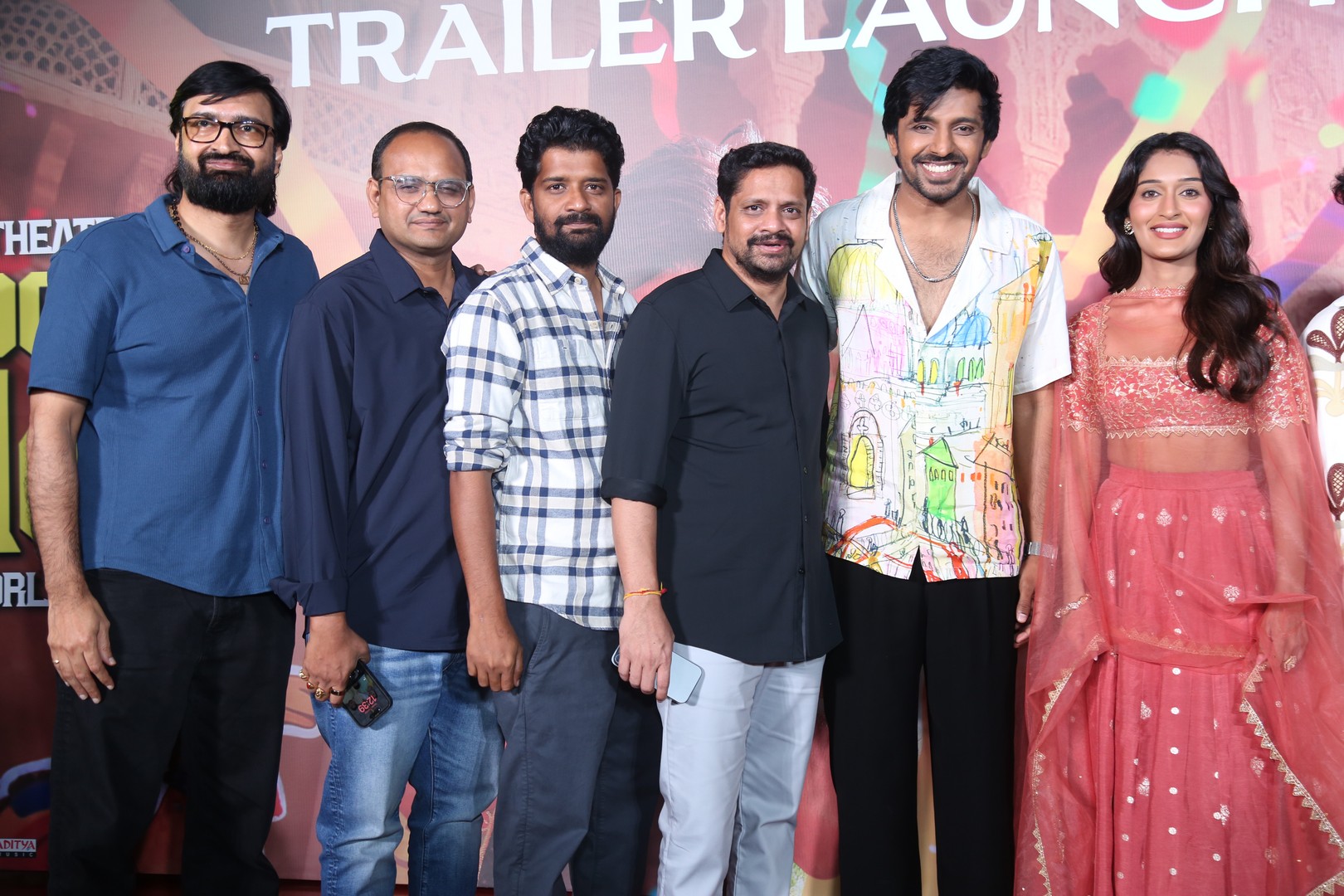 Mithra Mandali team posing for media cameras