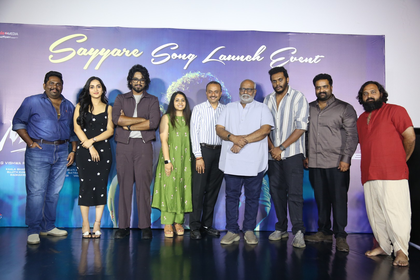 Mowgli cast and crew posing together at launch