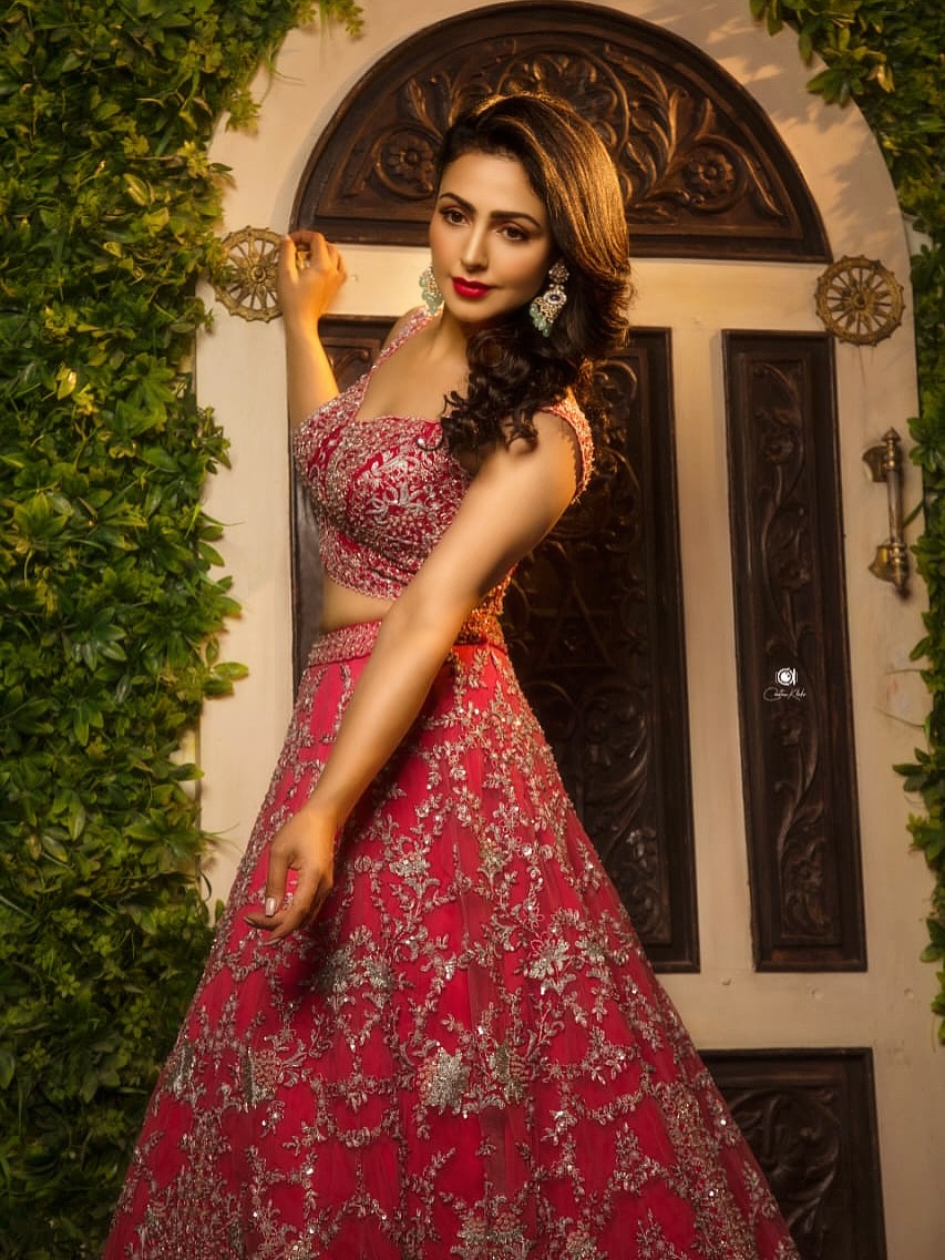 Nandini Rai radiating regal style and playful mischief in red
