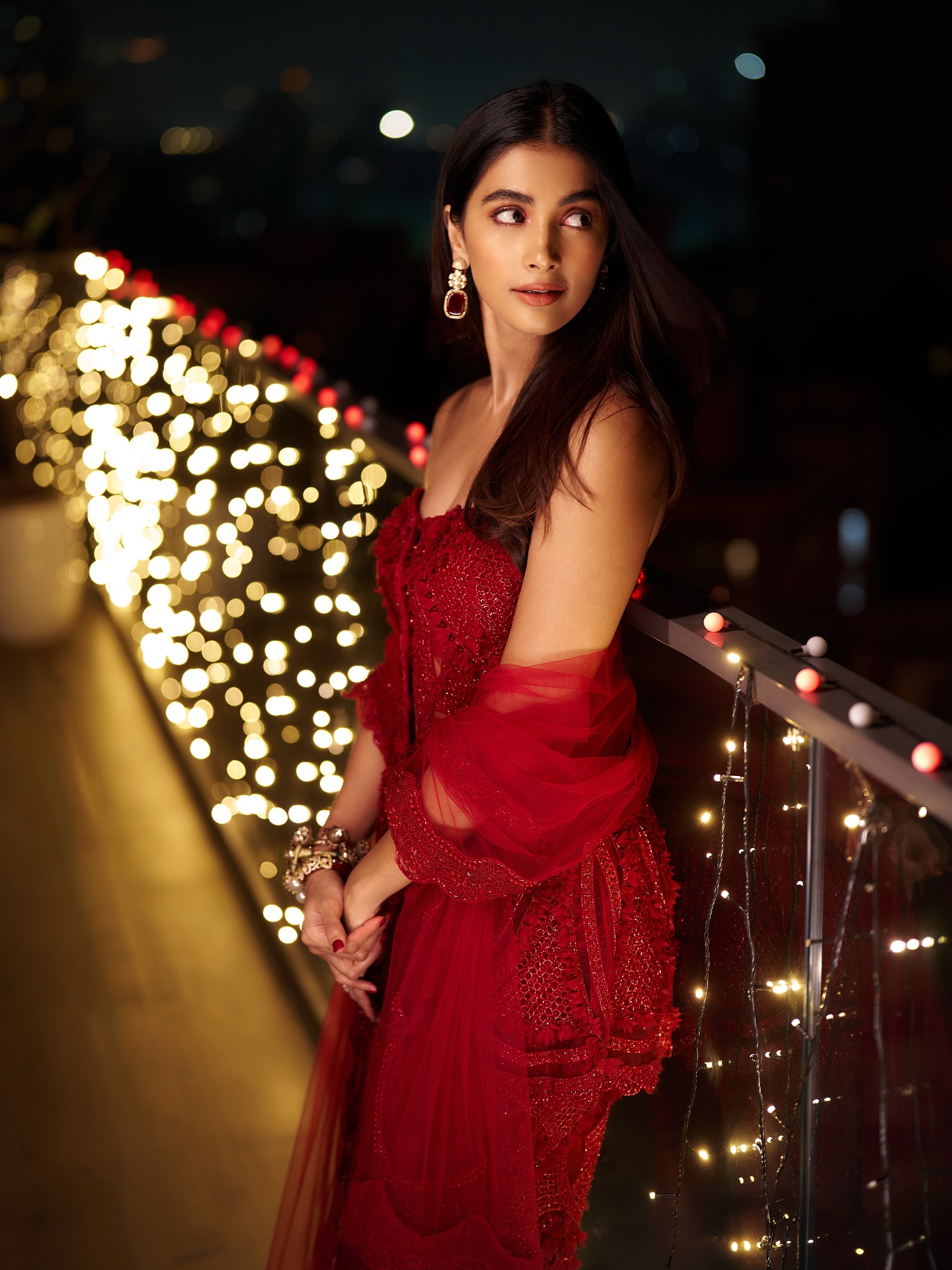 Pooja Hegde captivates in red ensemble with festive charm