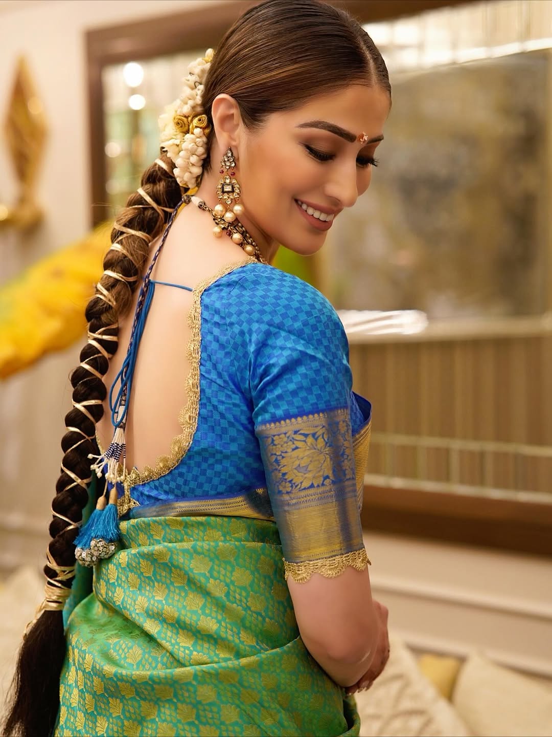 Raai Laxmi shining in vibrant Diwali saree and smile