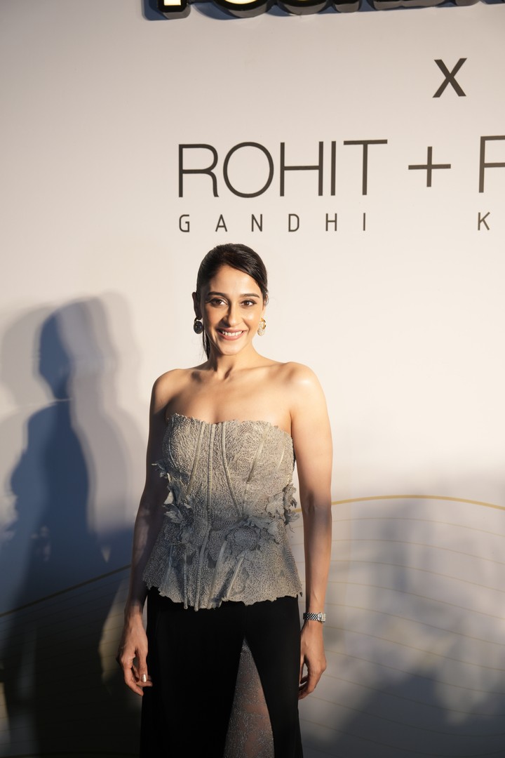 Regina Cassandra dazzling in a strapless top and confident smile