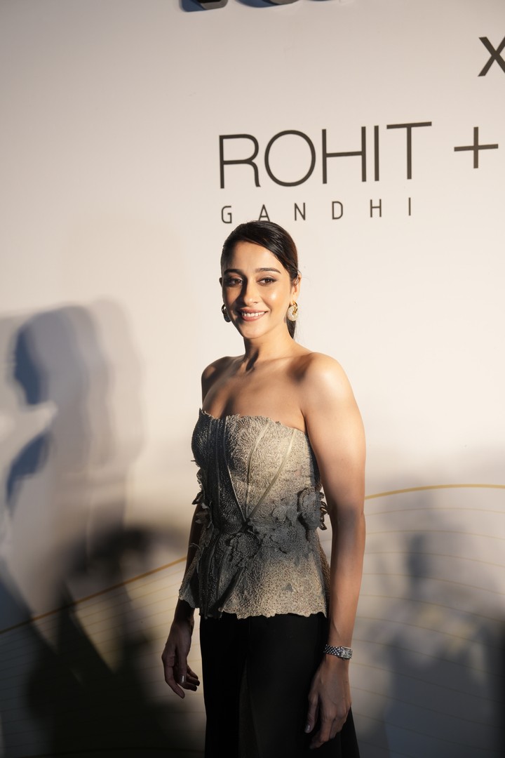 Regina Cassandra radiating modern elegance and confident charm on runway