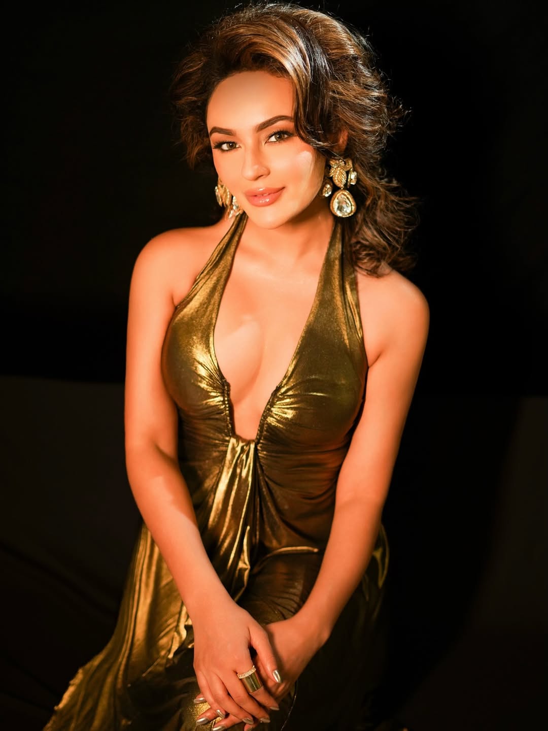 Seerat Kapoor shines in shimmering gold outfit