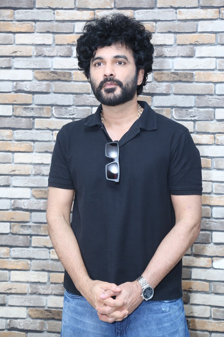 Siddu Jonnalagadda rocking black polo with effortless attitude