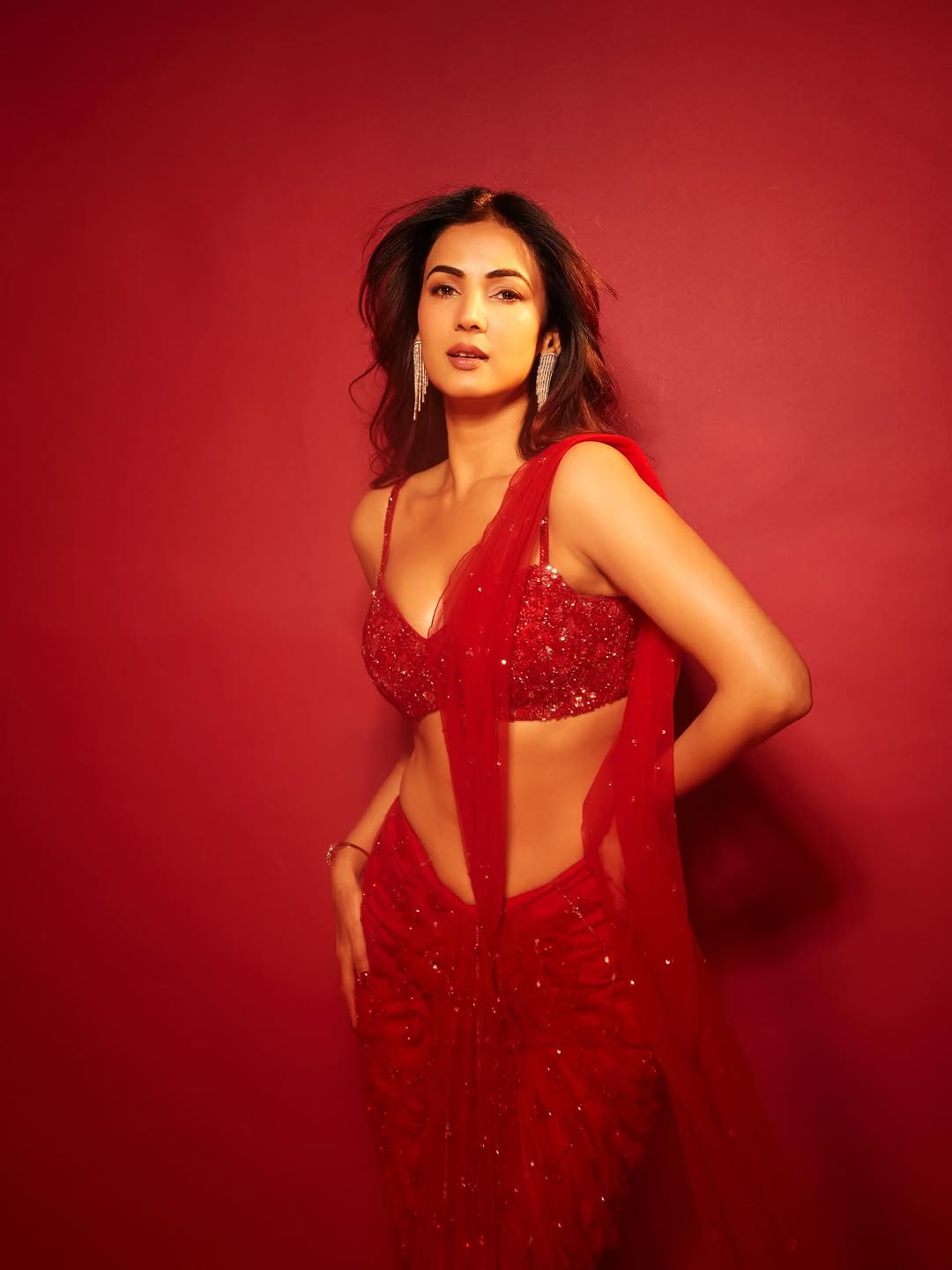 Sonal Chauhan flaunting bold charm in red attire