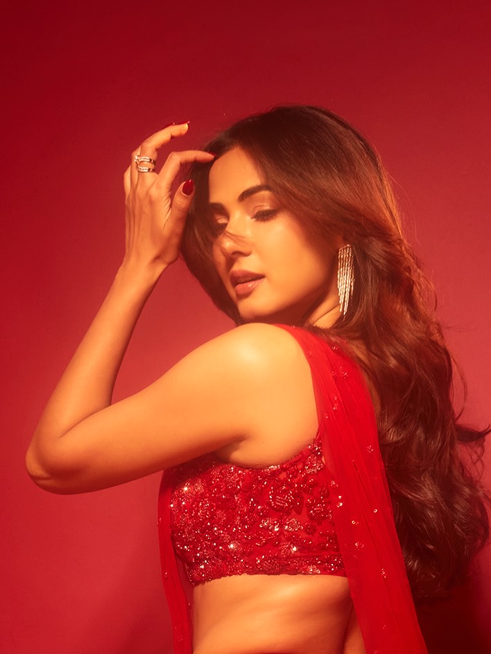 Sonal Chauhan glowing with red-hot elegance