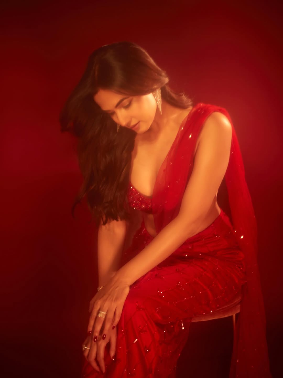 Sonal Chauhan blending glamour and grace in red